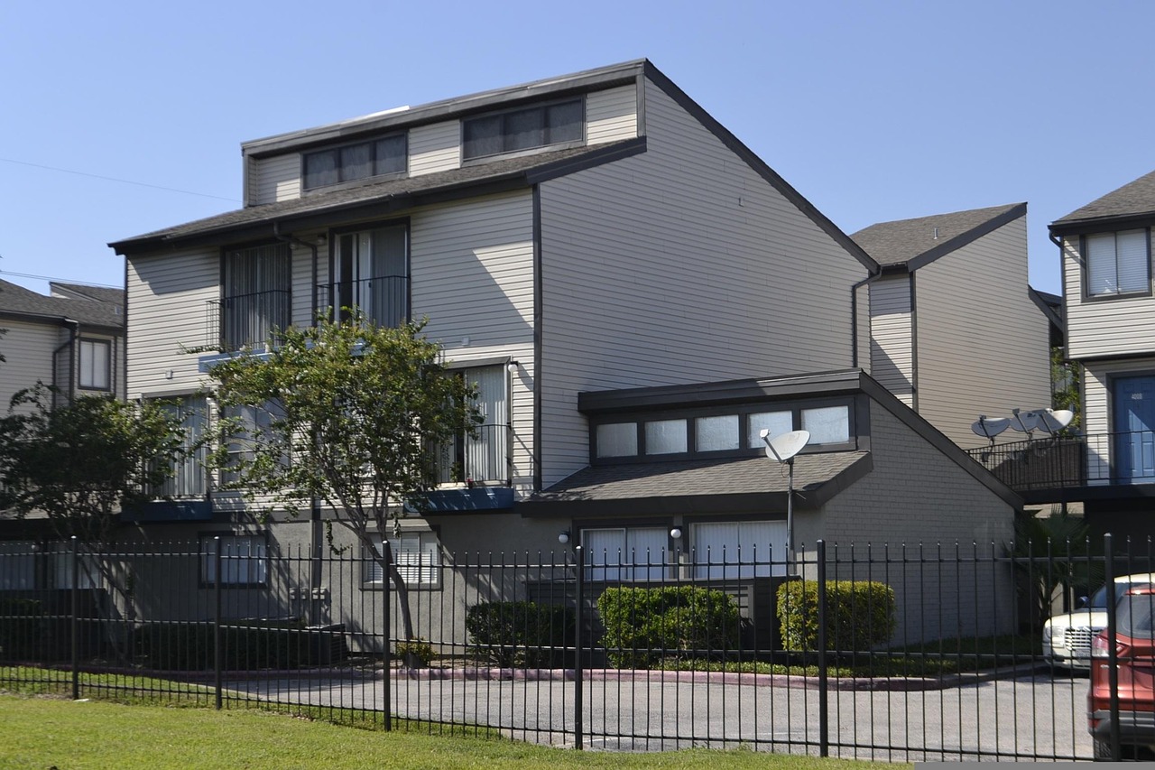 Metal fence running along the front boundary of a residential property